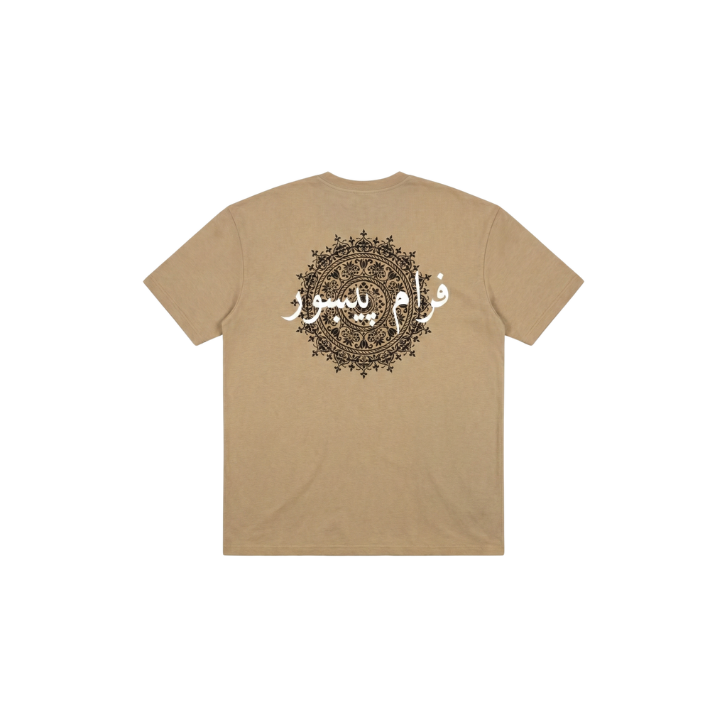 Beige t-shirt with black mandala design and text on the back against a white background
